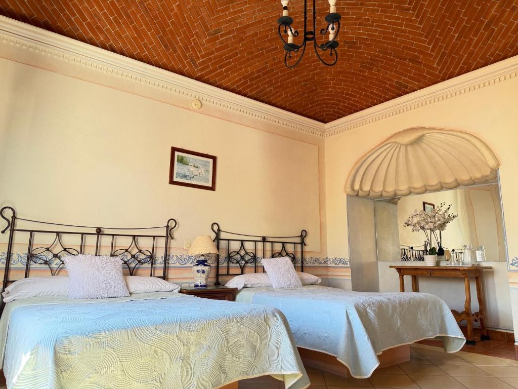 Habitación Celeste con concha de yesería y detalles en azul — foto 2