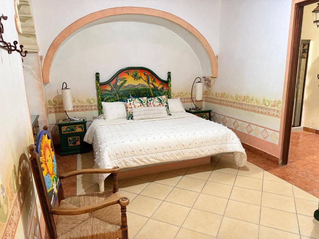 Habitación Tropical con cabecera pintada de guacamayas — foto 2